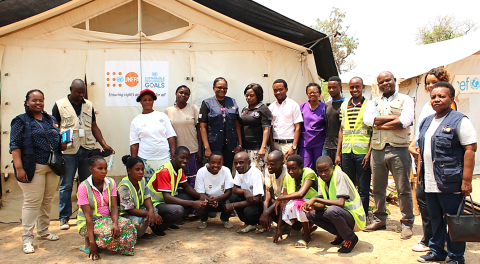 Community based volunteers in Mantapala refugee settlement pose for a photo with UNFPA Zambia Representative, Ms. Gift Malunga and UNFPA staff during a monitoring visit in September 2018.