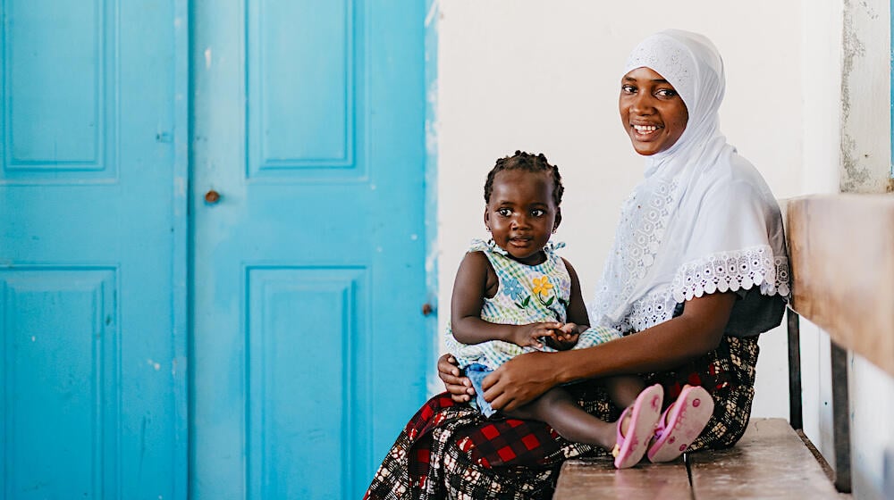 A woman with her baby.