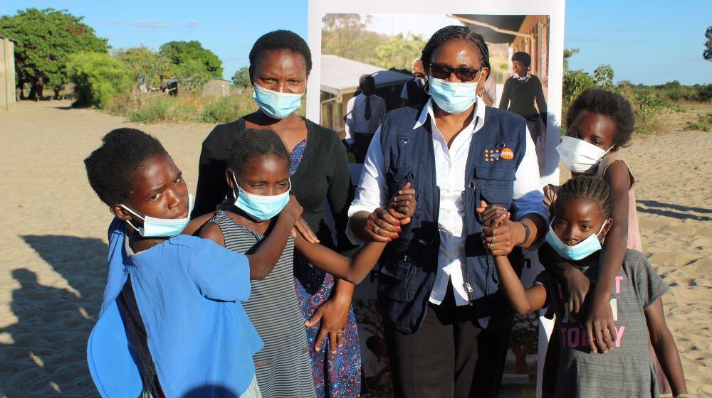 UNFPA Representative Ms. Gift Malunga with young people in Western Province